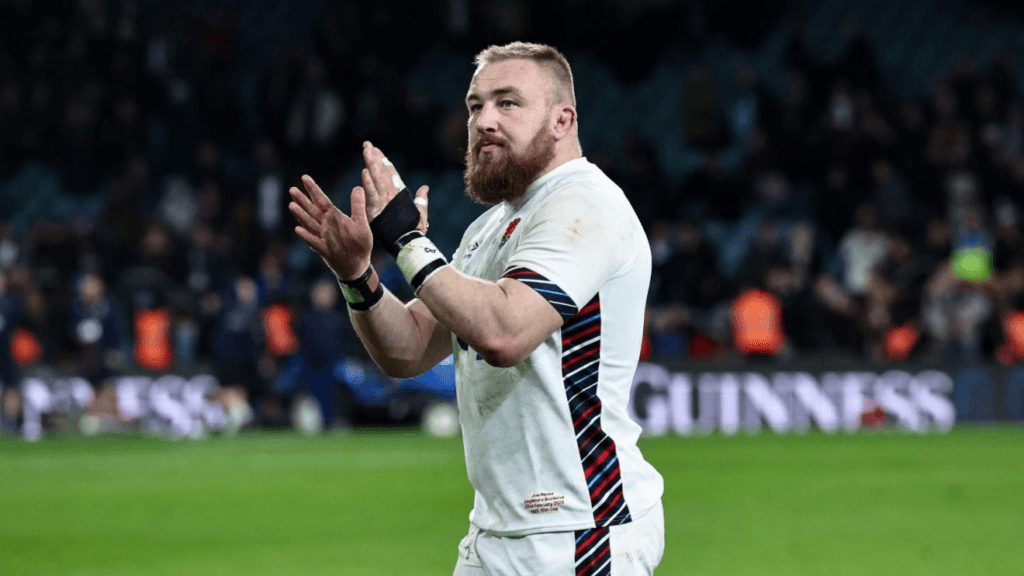 Joe Heyes applauds the crowd after England match, showing confidence in his England return under guidance from Michael Cheika