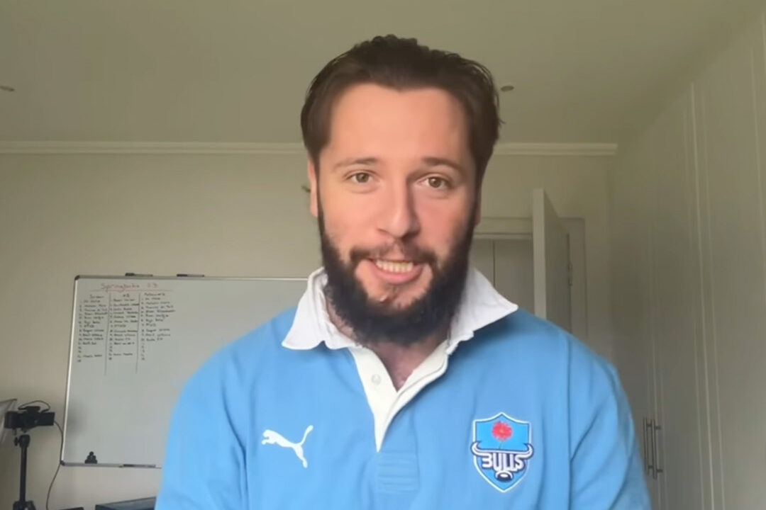 A South African rugby influencer reacts after the All Blacks beat the Bulls 50-19 at Loftus Versfeld