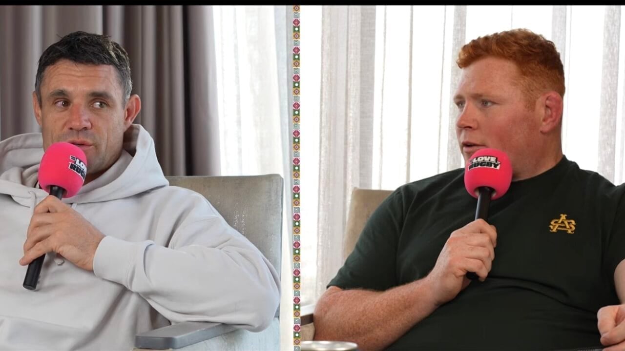 Dan Carter and Steven Kitshoff speaking into For The Love Of Rugby microphones during the South Africa podcast