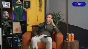 Gio Aplon miming a phone call on Behind the Ruck as he tells the story of Kurt-Lee Arendse ringing him on the morning of his Springboks debut