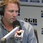 Rocky Elsom, former Wallabies captain, speaking into a 2GB microphone on Ben Fordham Live in Sydney about his French conviction and arrest warrant