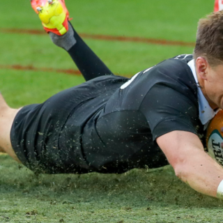 All Blacks player ratings vs Wallabies: an All Black in the black jersey dives over the line to score a try