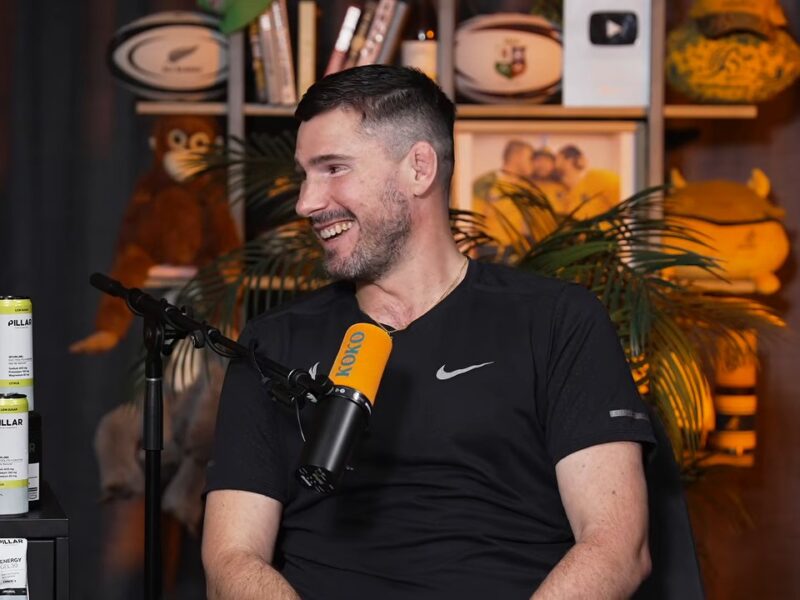 Nathan Charles, former Wallabies hooker, smiles on the Kick Offs and Kick Ons couch while talking about his foundation and life with MND